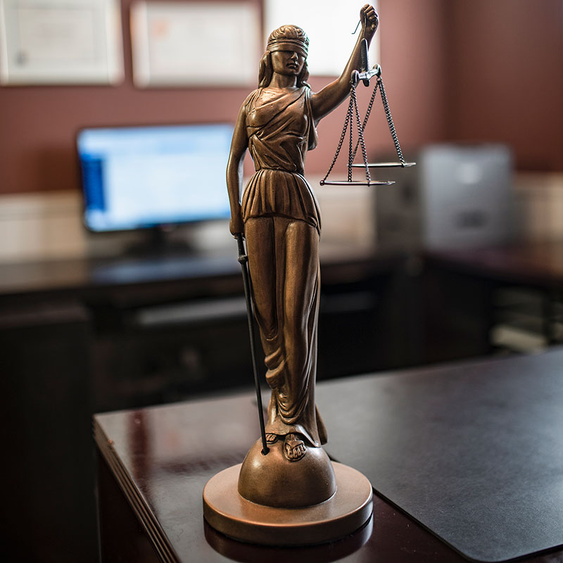 Lady Justice Statue on Desk